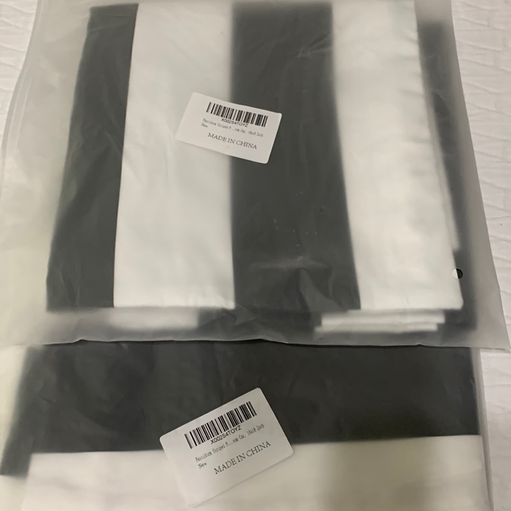 Black and white striped pillow covers. 18x18